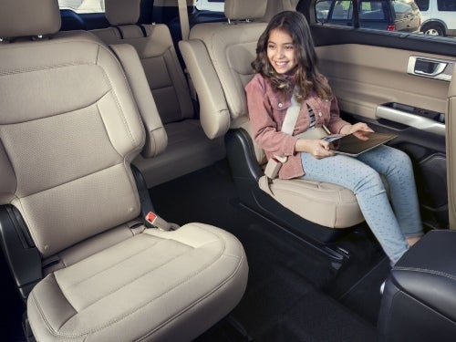 2024 Ford Explorer view of middle and back seats with child in middle row