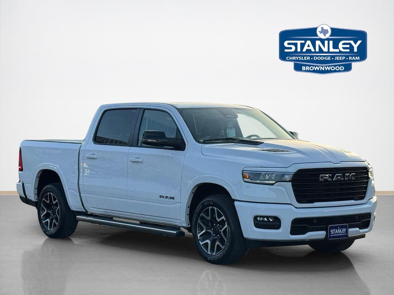 2025 RAM 1500 Laramie in Bright White Clearcoat — front three-quarter view