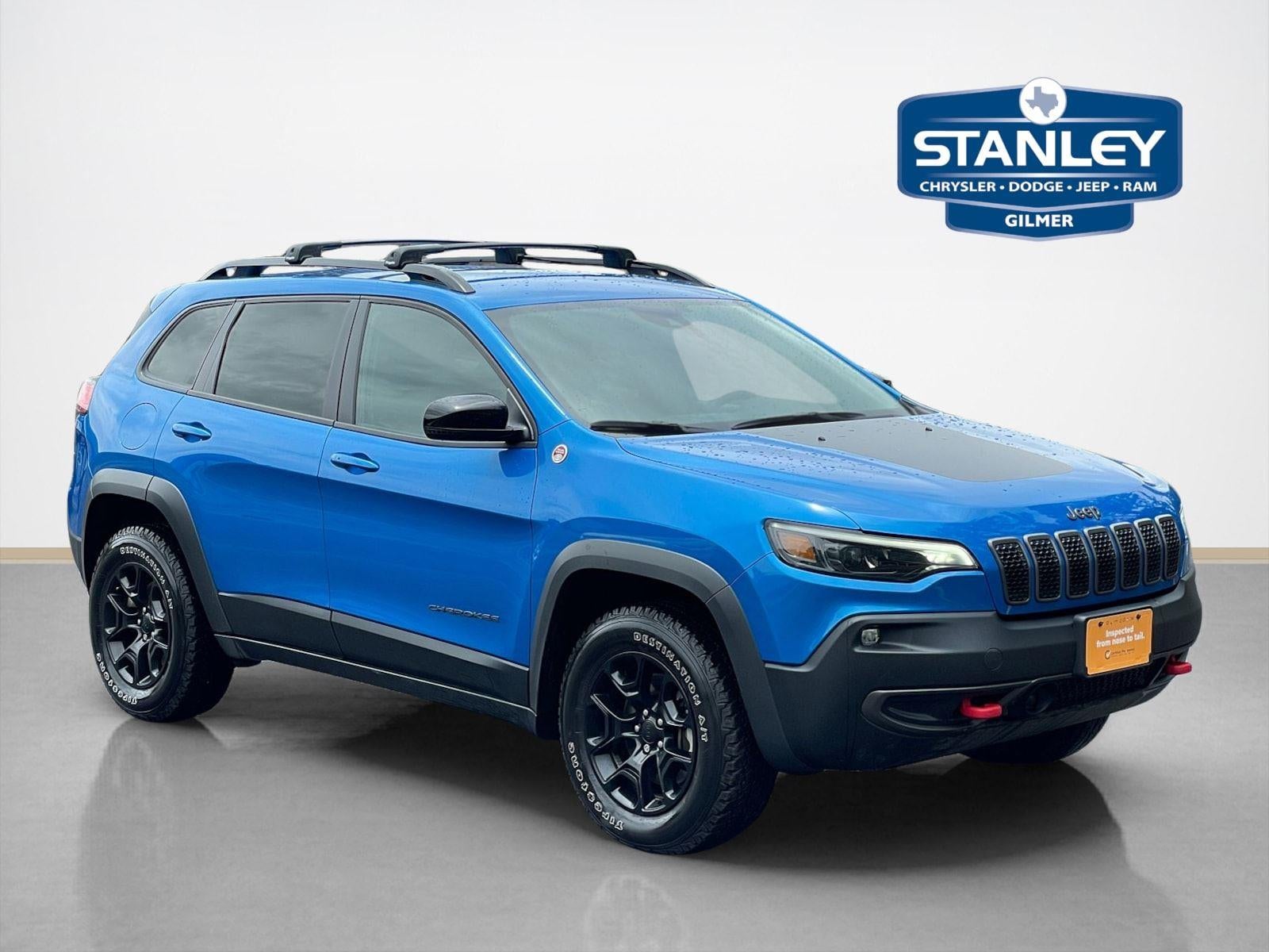 2022 Jeep Cherokee Trailhawk in Hydro Blue Pearlcoat — front three-quarter view