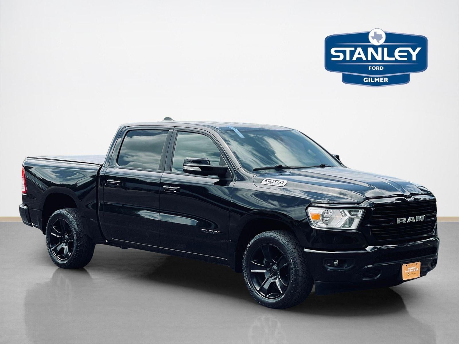 2020 RAM 1500 Lone Star in Diamond Black Crystal Pearlcoat — front three-quarter view