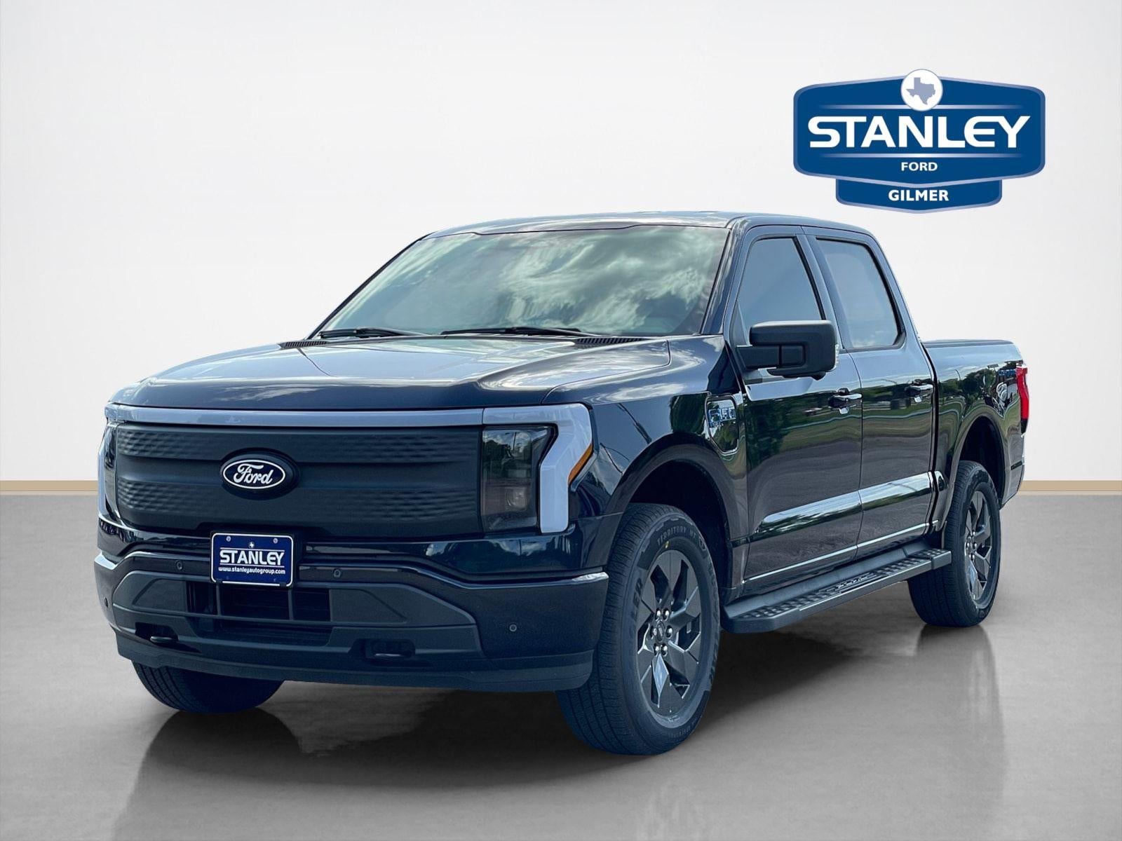 2025 Ford F-150 Lightning — rear three-quarter view
