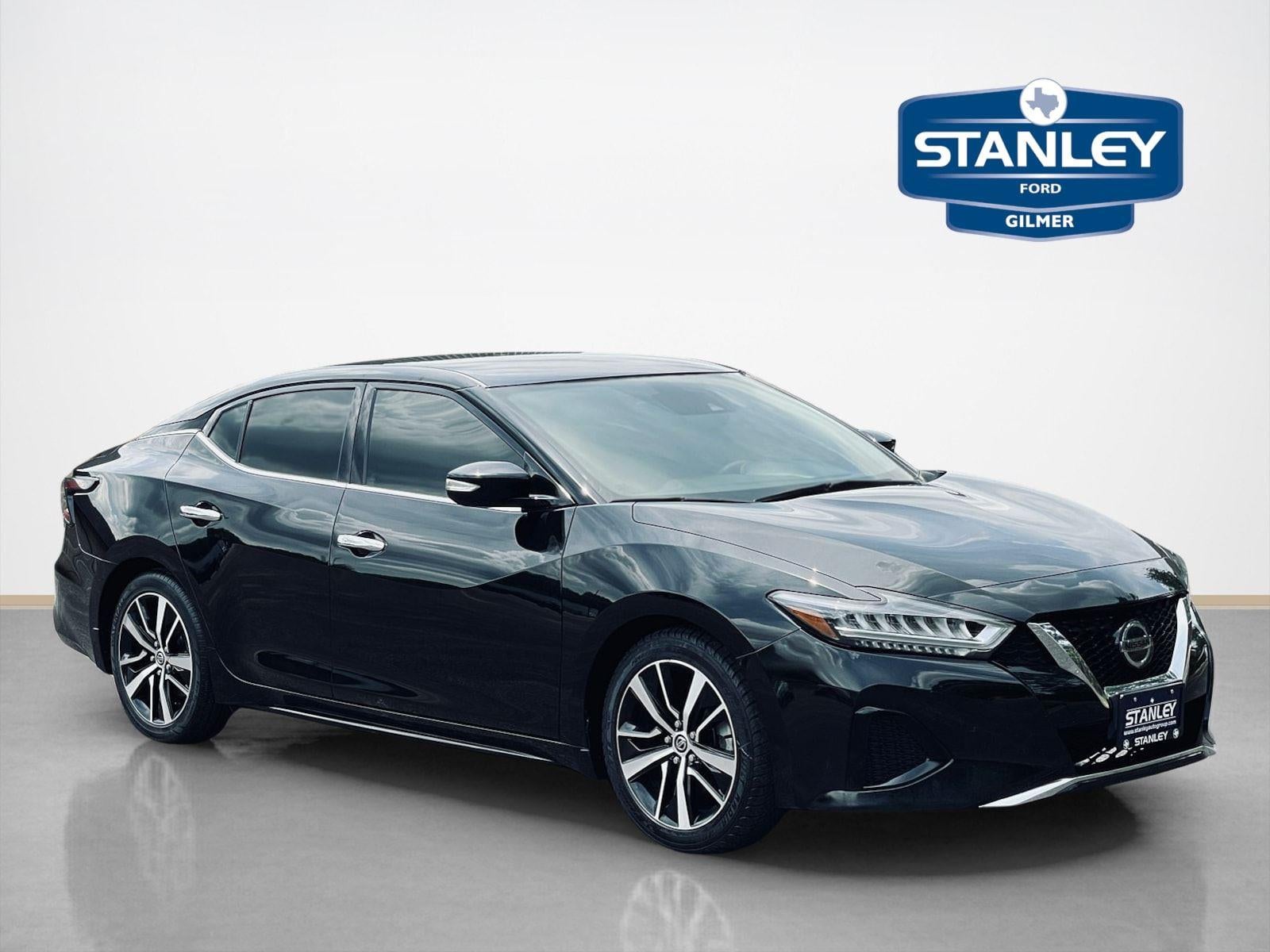 2022 Nissan Maxima SV in Super Black — front three-quarter view