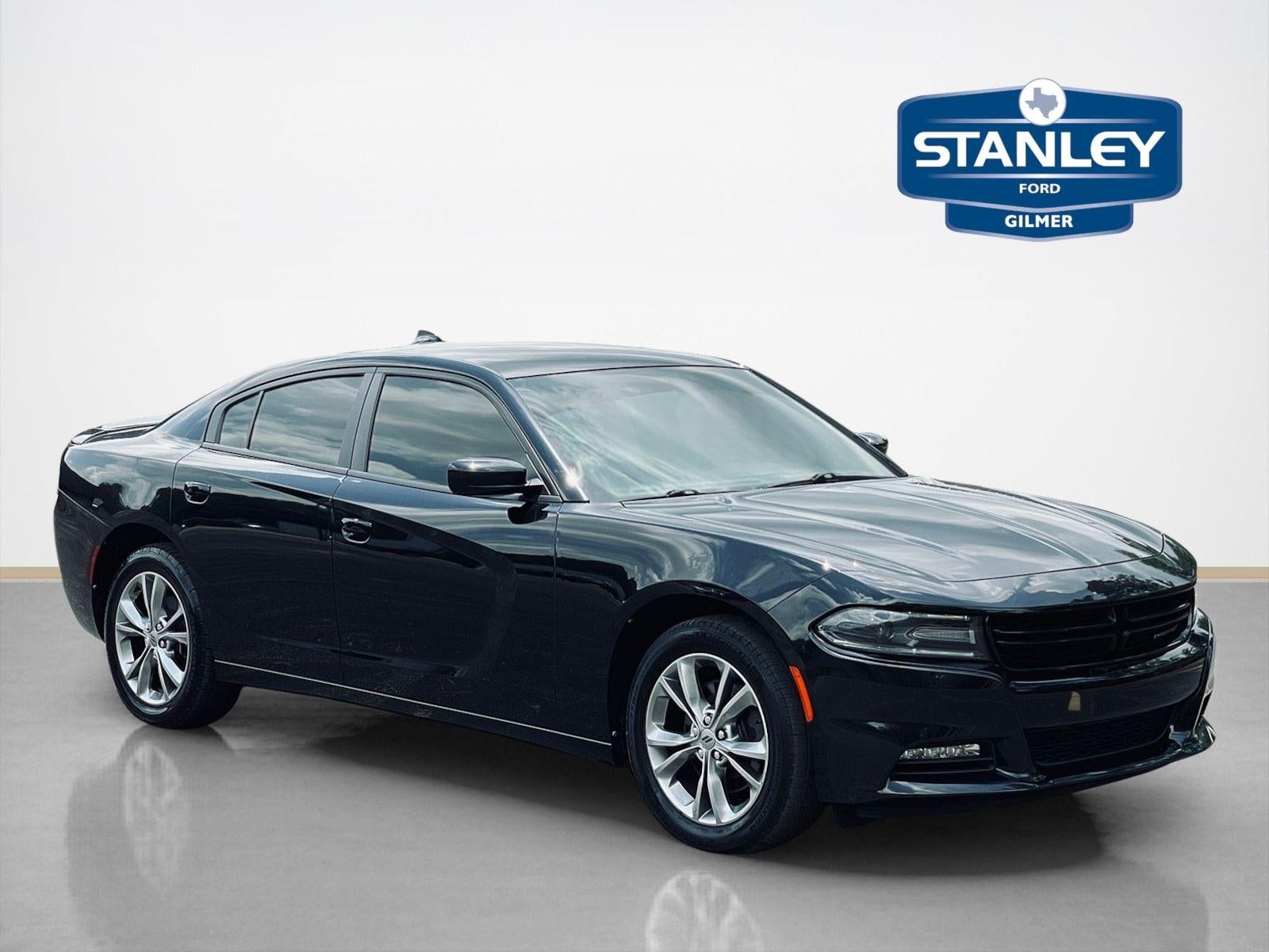 2020 Dodge Charger SXT in Pitch Black Clearcoat — front three-quarter view