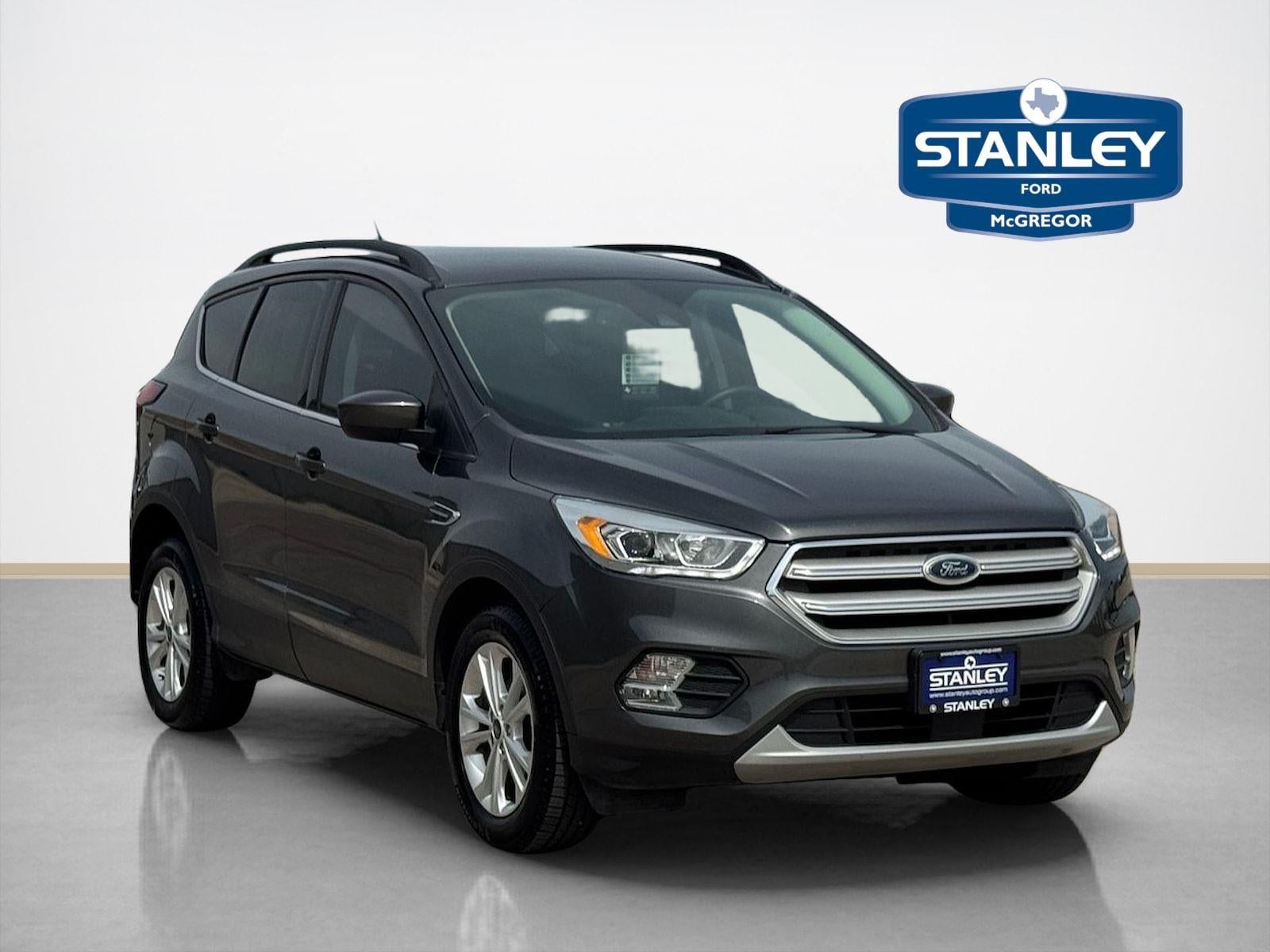 2019 Ford Escape SEL in Agate Black Metallic — front three-quarter view