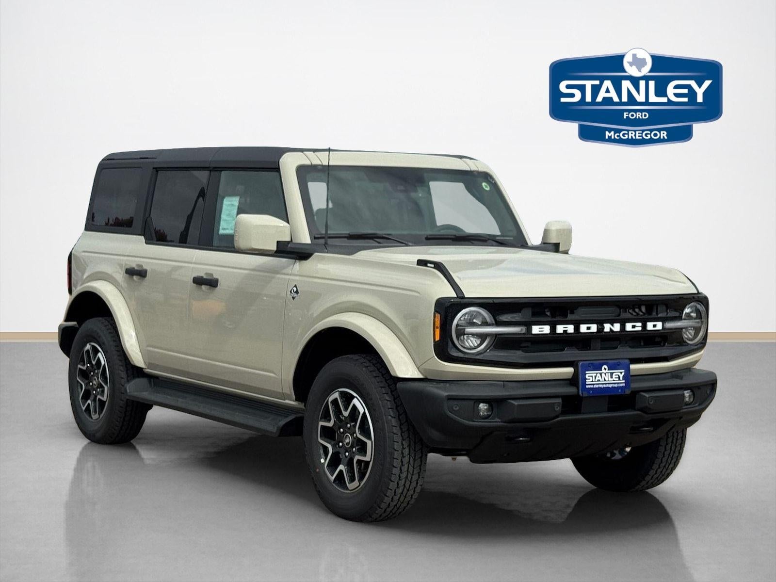 2026 Ford Bronco Outer Banks in Desert Sand — front three-quarter view