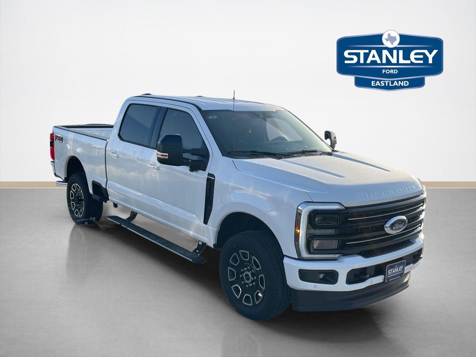 2026 Ford Super Duty F-350 Platinum in Star White Metallic Tri-Coat — front three-quarter view