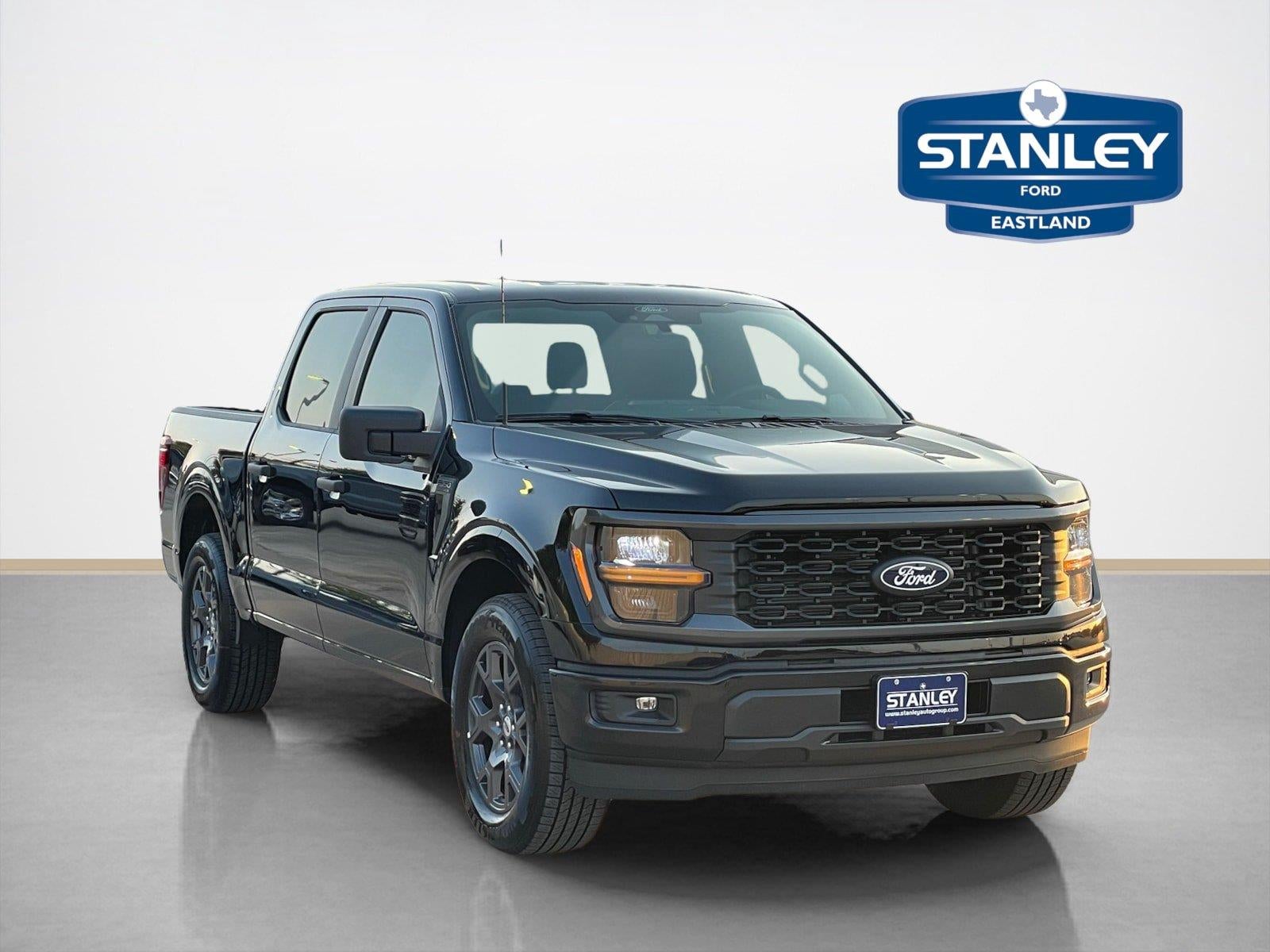 2026 Ford F-150 STX in Agate Black Metallic — front three-quarter view