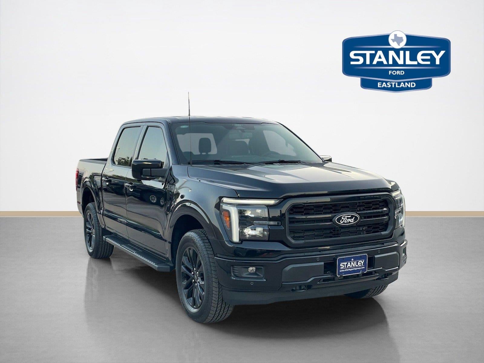 2026 Ford F-150 Lariat in Agate Black Metallic — front three-quarter view