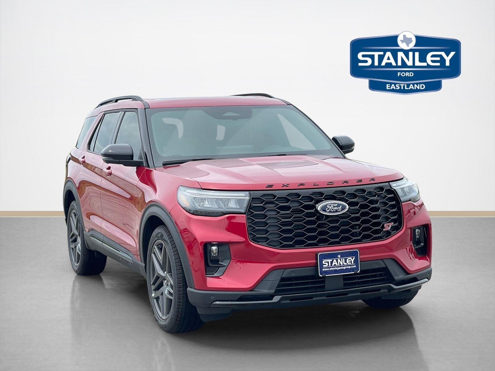 2026 Ford Explorer ST in Rapid Red Metallic Tinted Clearcoat — front three-quarter view