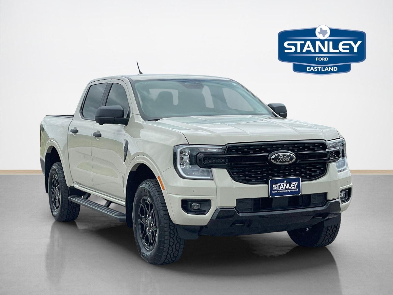 2026 Ford Ranger XLT in Desert Sand — front three-quarter view