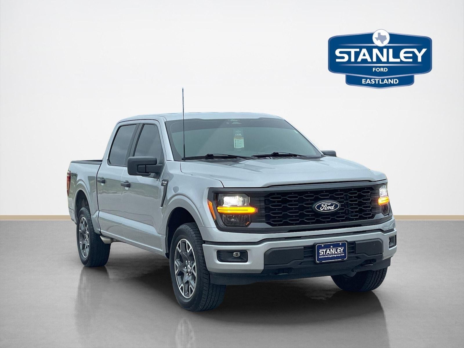 2025 Ford F-150 STX in Iconic Silver Metallic — front three-quarter view