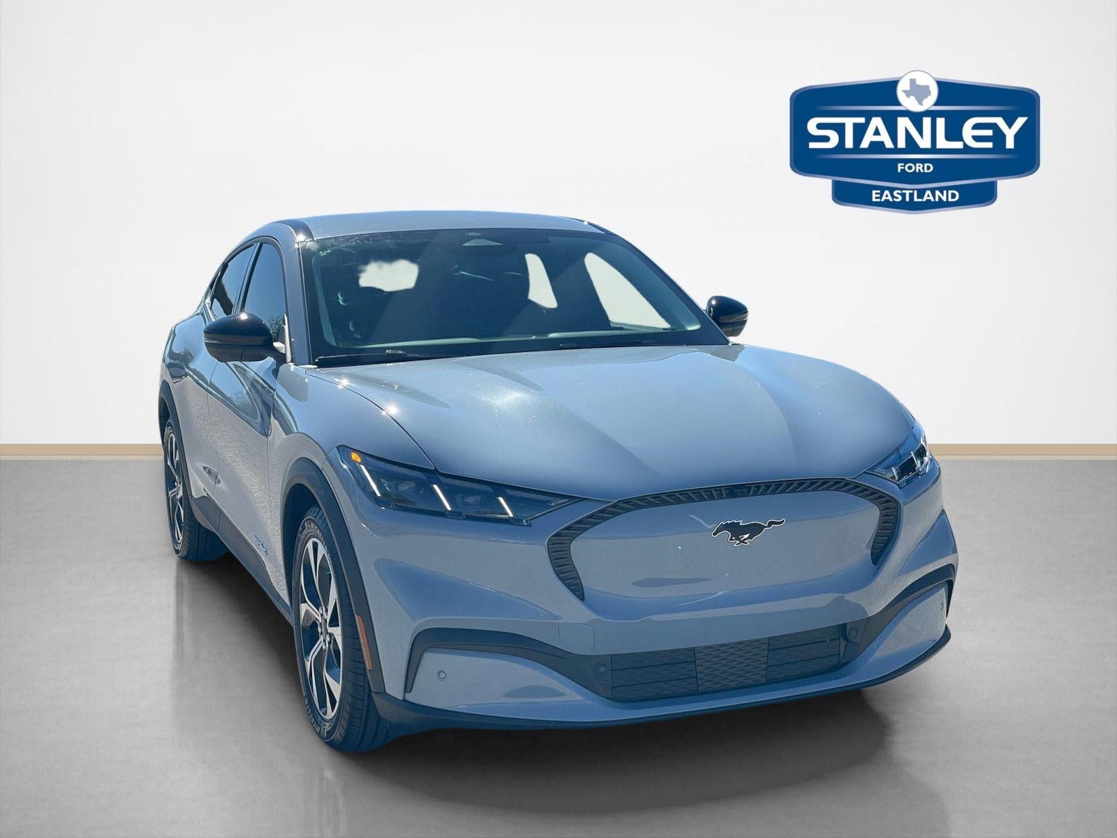 2025 Ford Mustang Mach-E Select in Glacier Gray Metallic Tricoat — front three-quarter view